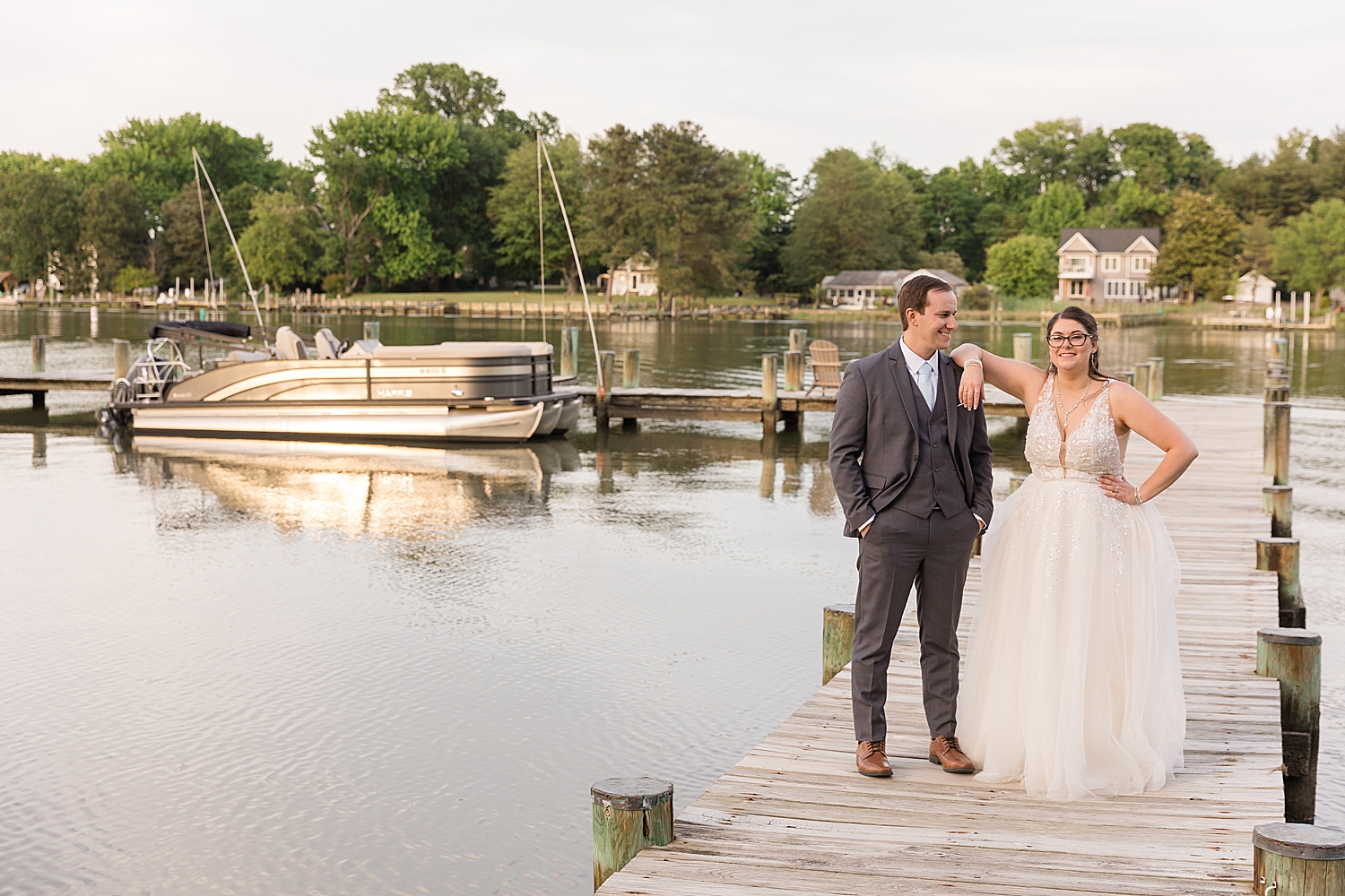 bride and groom portrait on pier, chesapeake bay