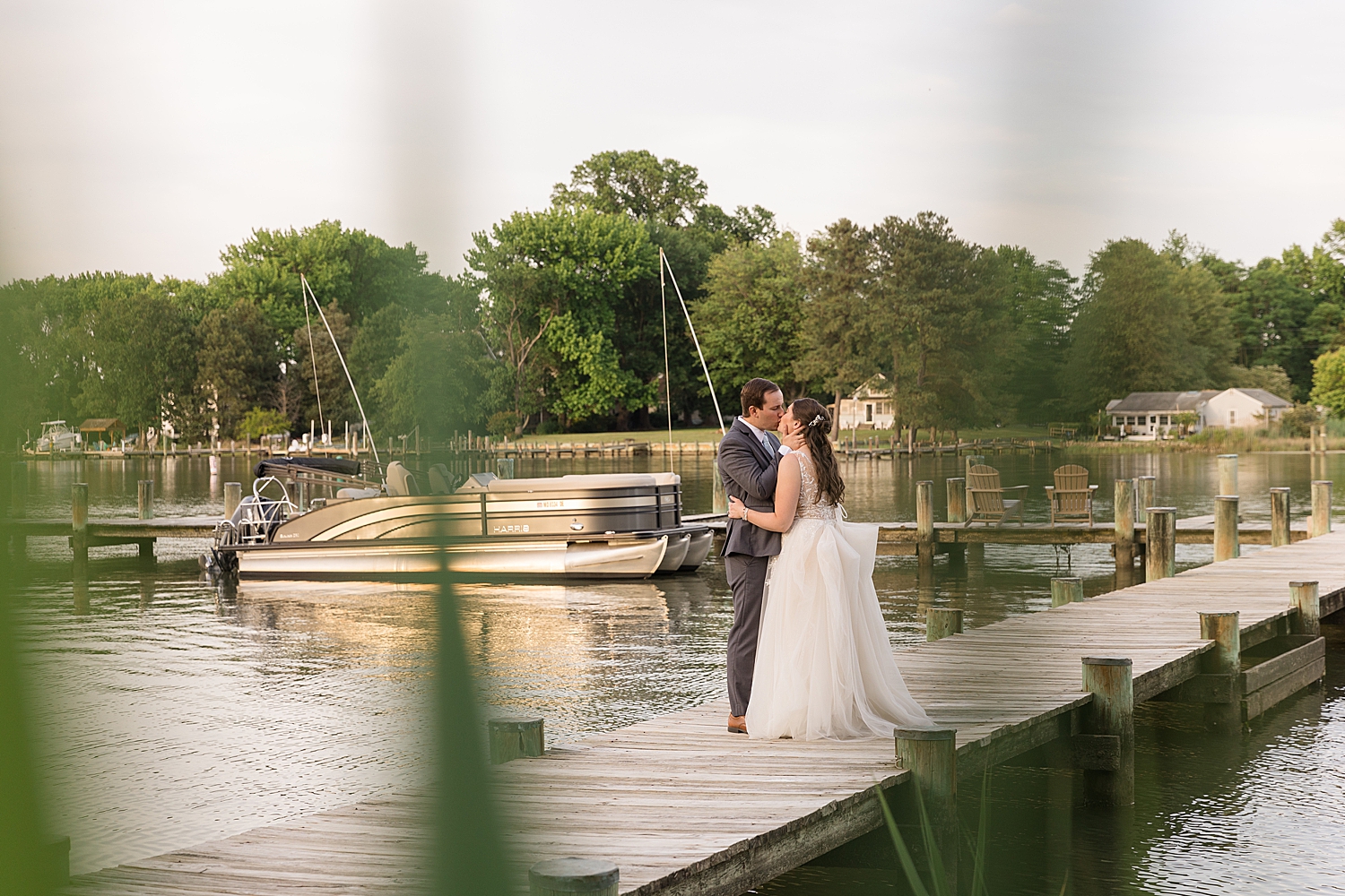 bride and groom portrait on pier, chesapeake bay