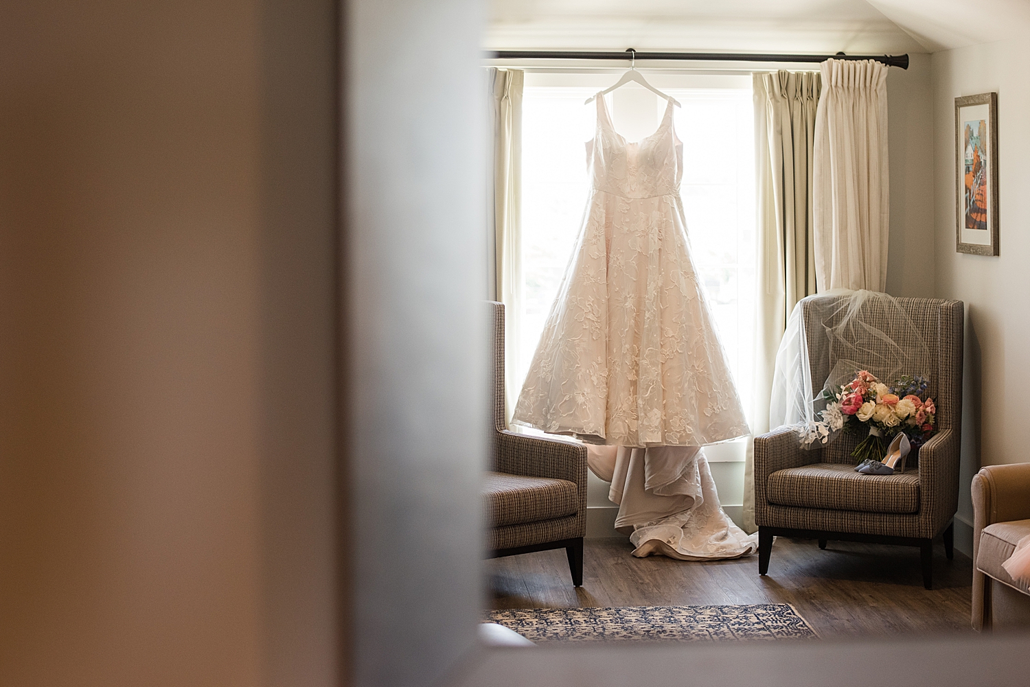 dress hanging in getting ready suite