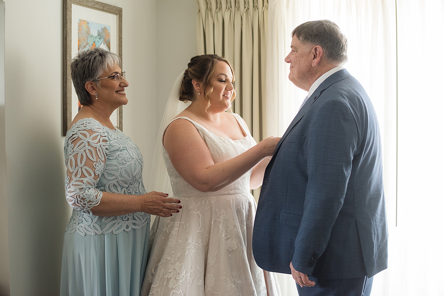 bride with her parents