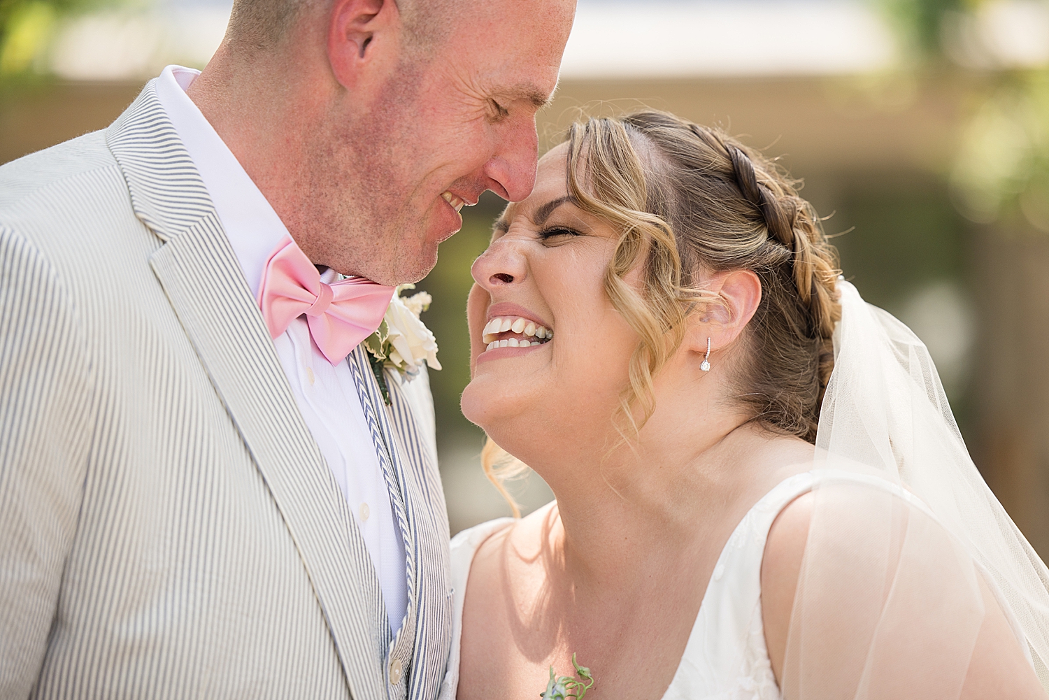 couple portrait summer wedding, bride laughing