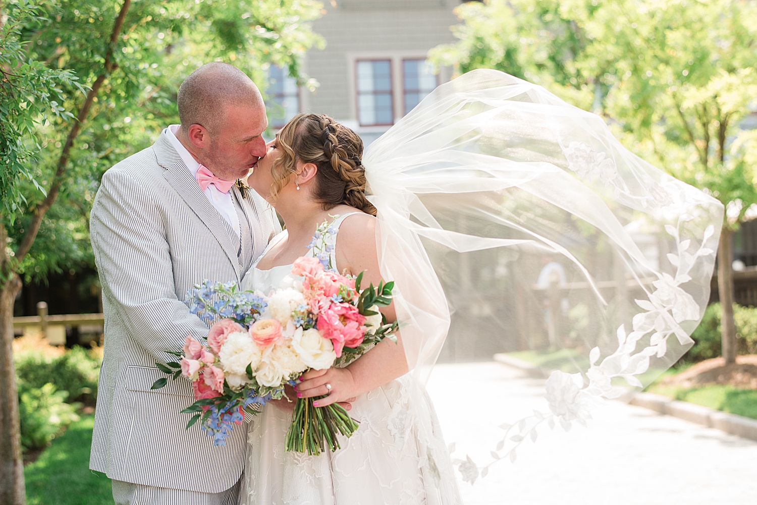 couple portrait summer wedding, veil toss