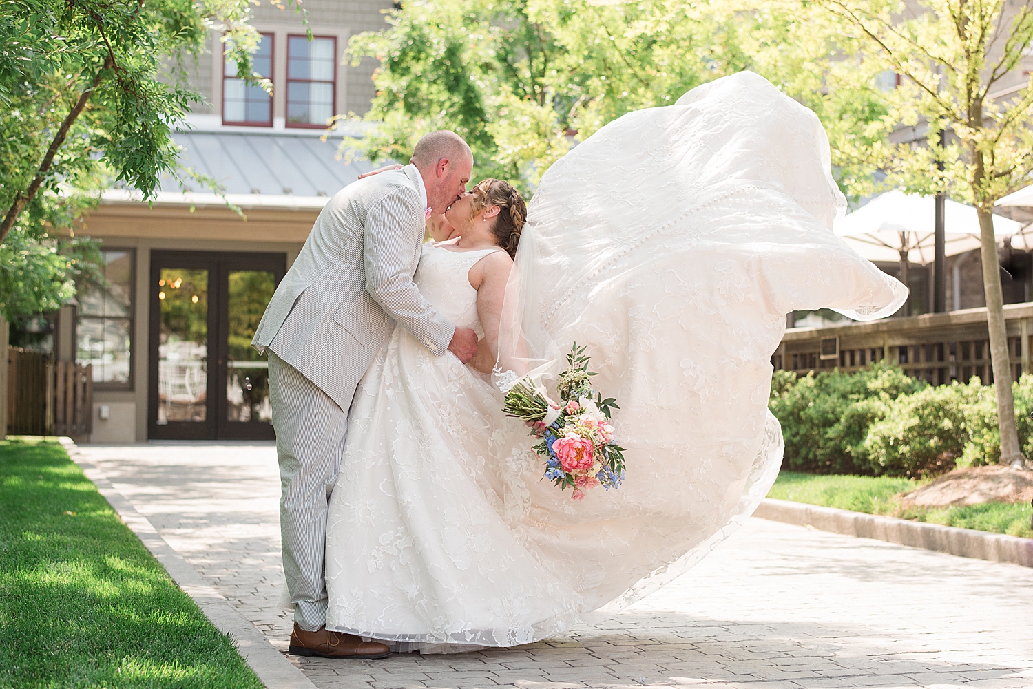 couple portrait summer wedding, dress toss