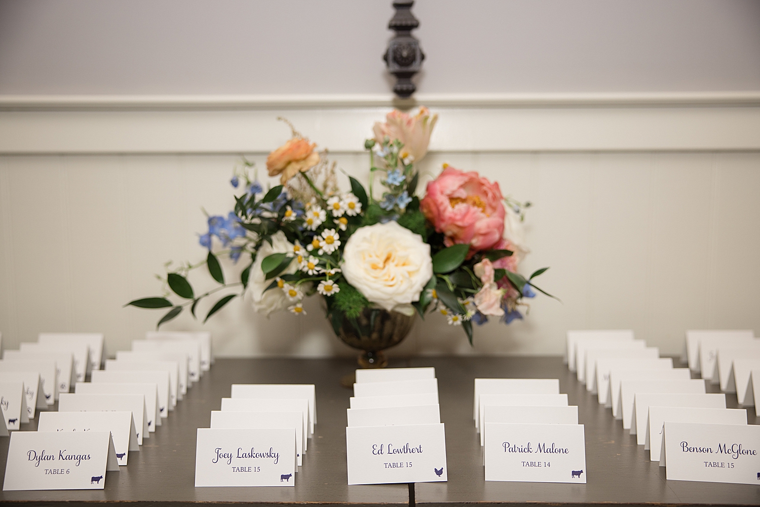 escort card display with florals