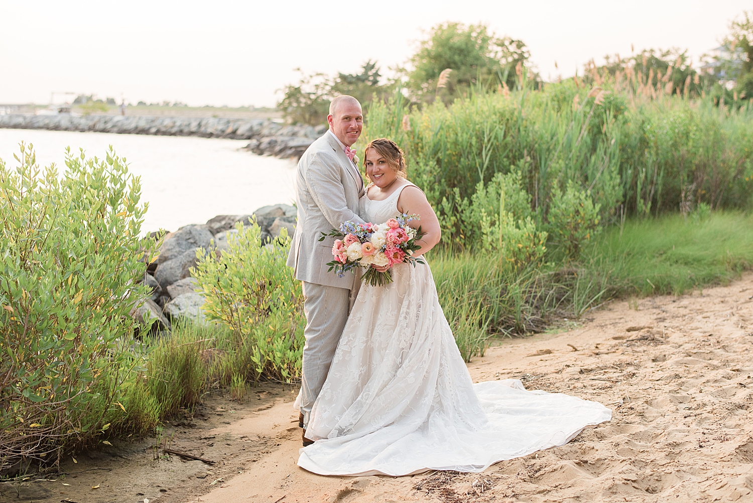 bride and groom couple portrait on beach 