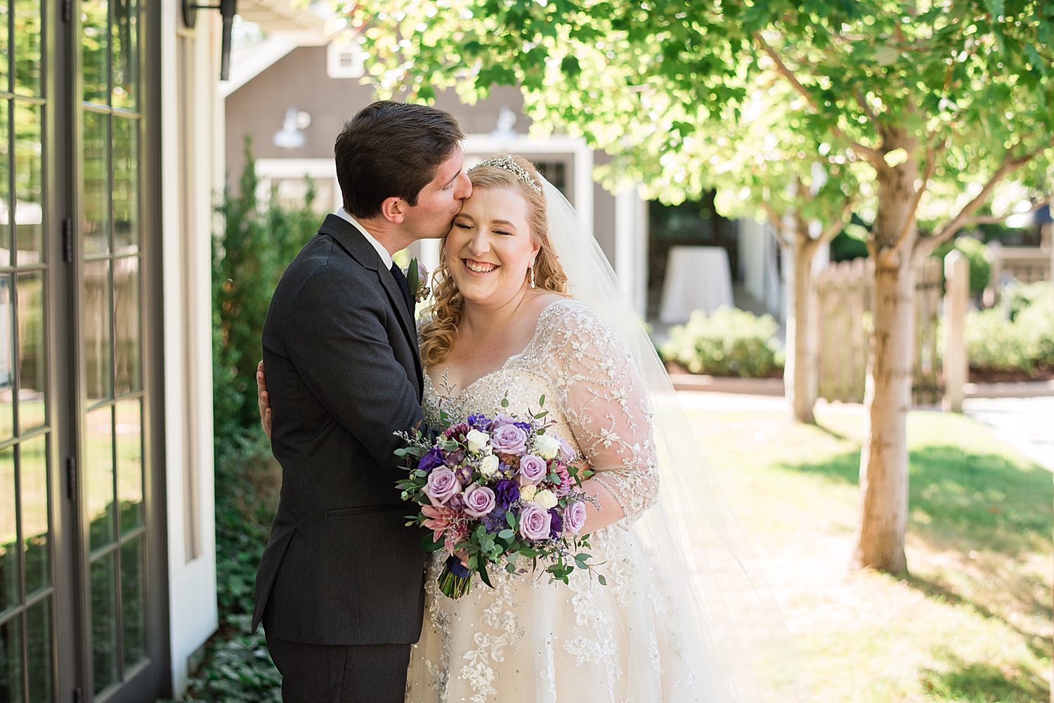 bride and groom portrait under trees