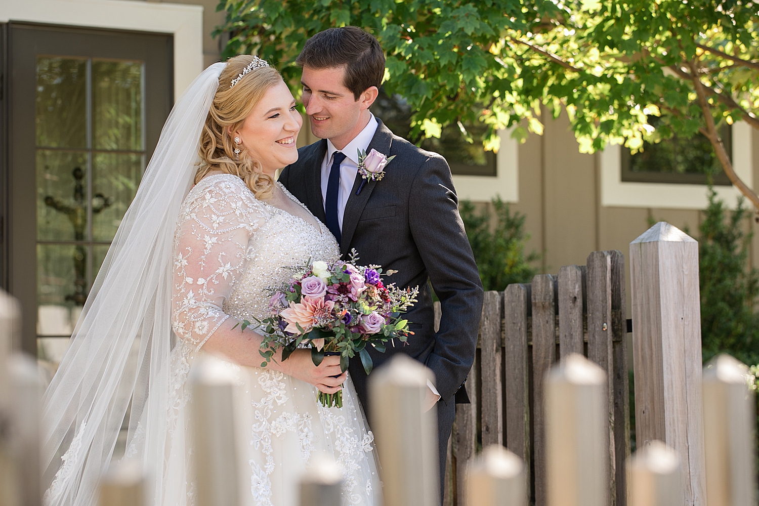 bride and groom portrait in chesapeake bay inn courtyard