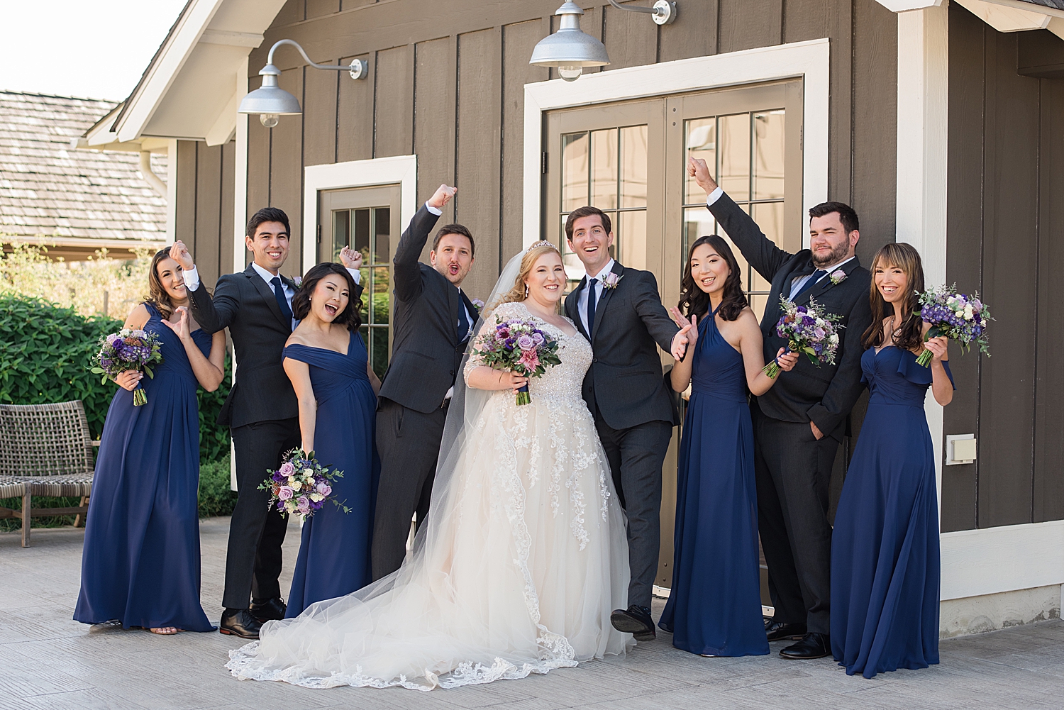 full wedding party cheering