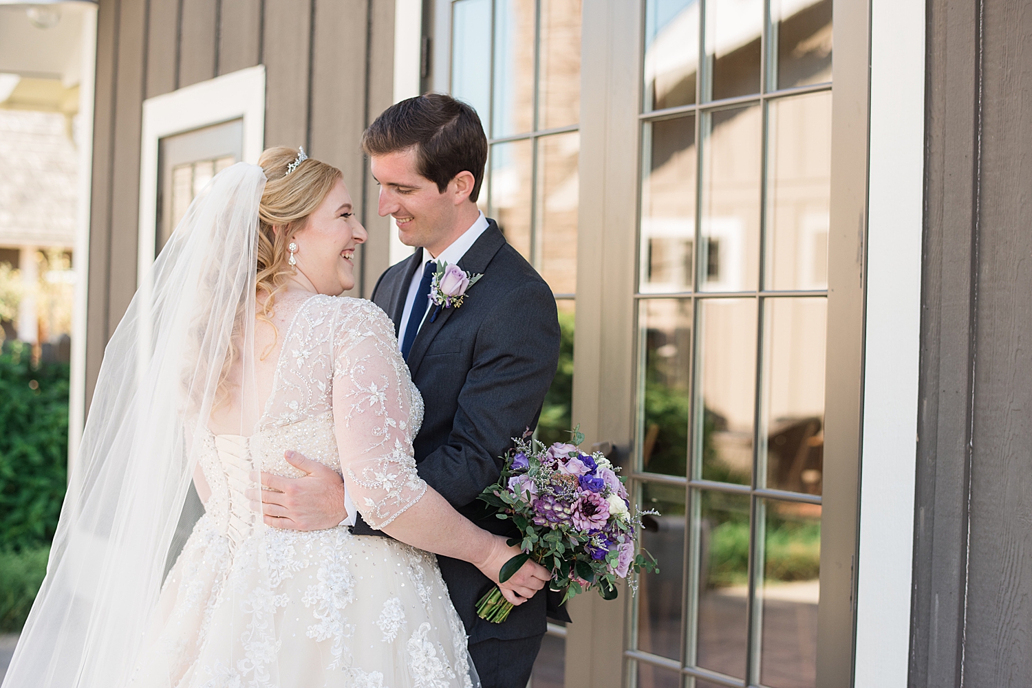 bride and groom portrait in chesapeake bay inn courtyard