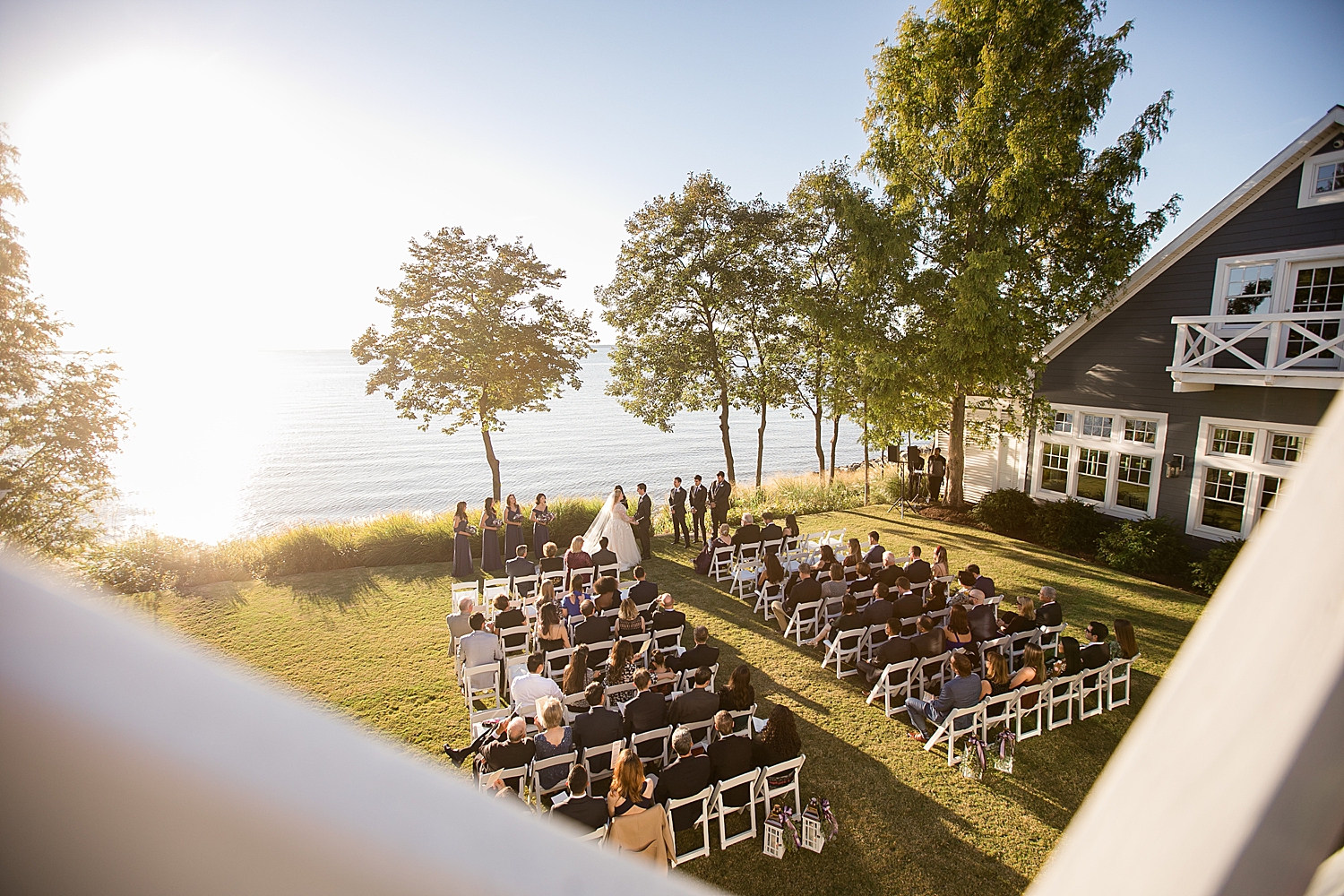 wide shot of ceremony overlooking chesapeake bay