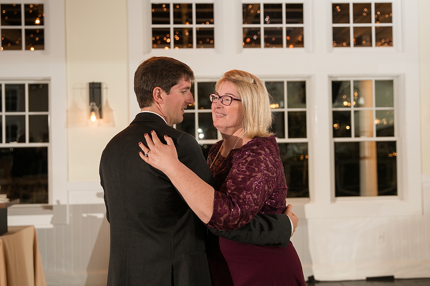 groom dances with mom