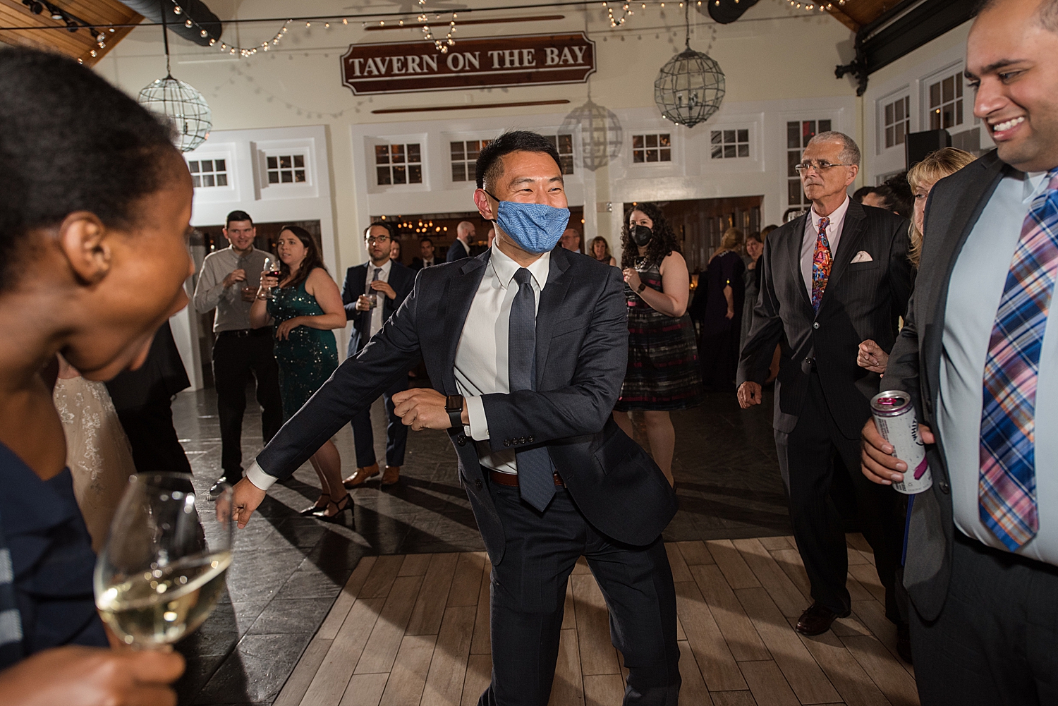 candid wedding guests dancing