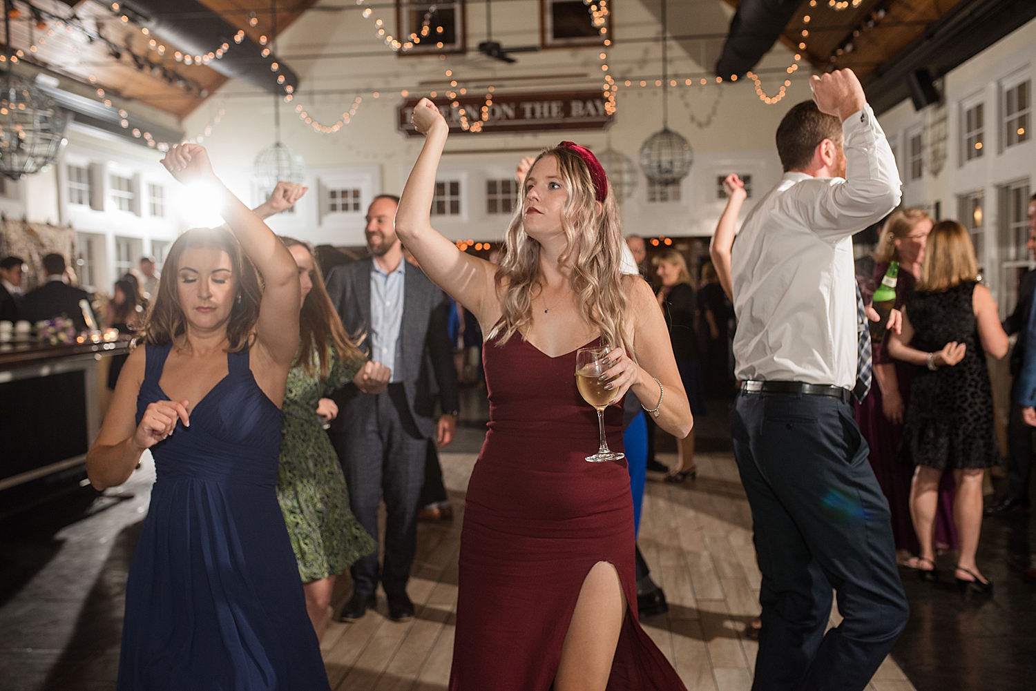 candid wedding guests dancing