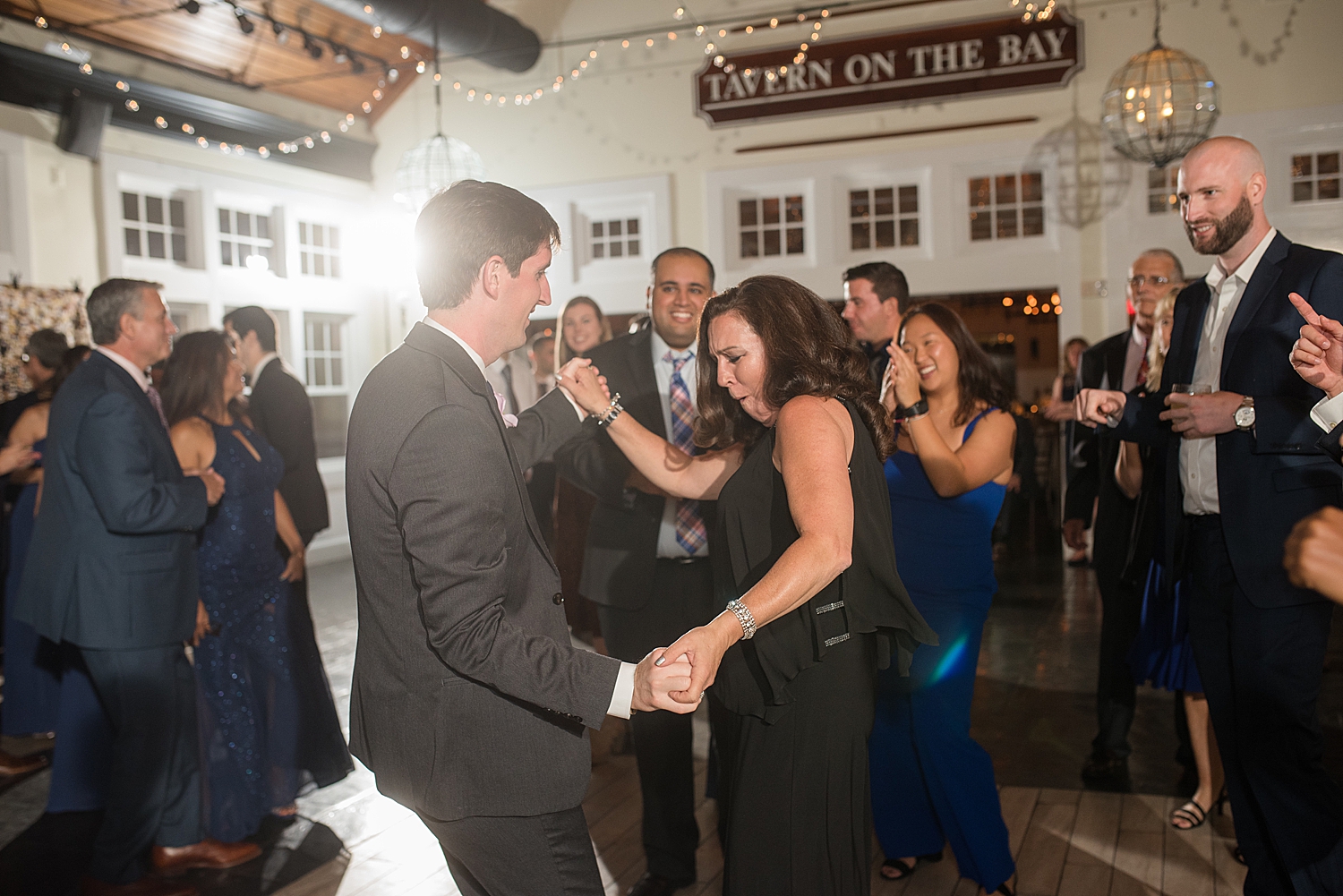 candid wedding guests dancing