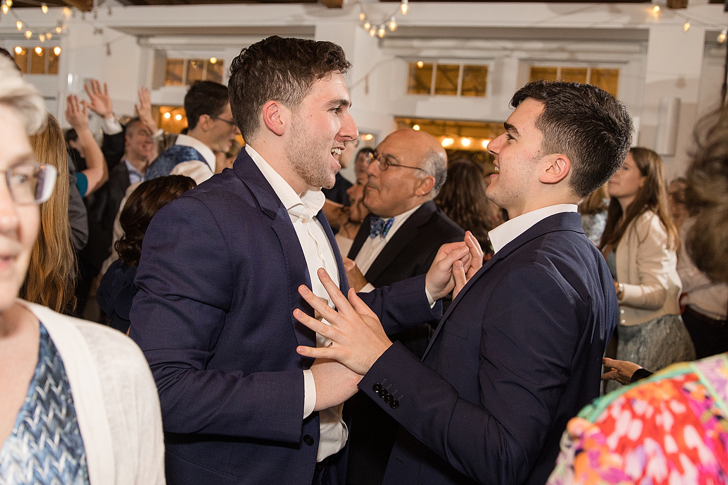 candid guests dancing during reception