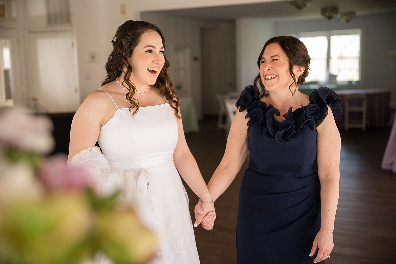 bride getting ready with her mom