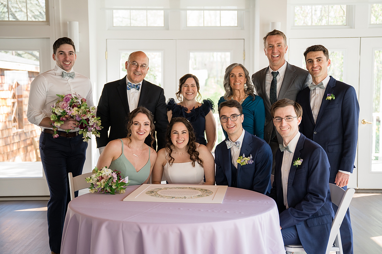 couple and family after ketubah signing