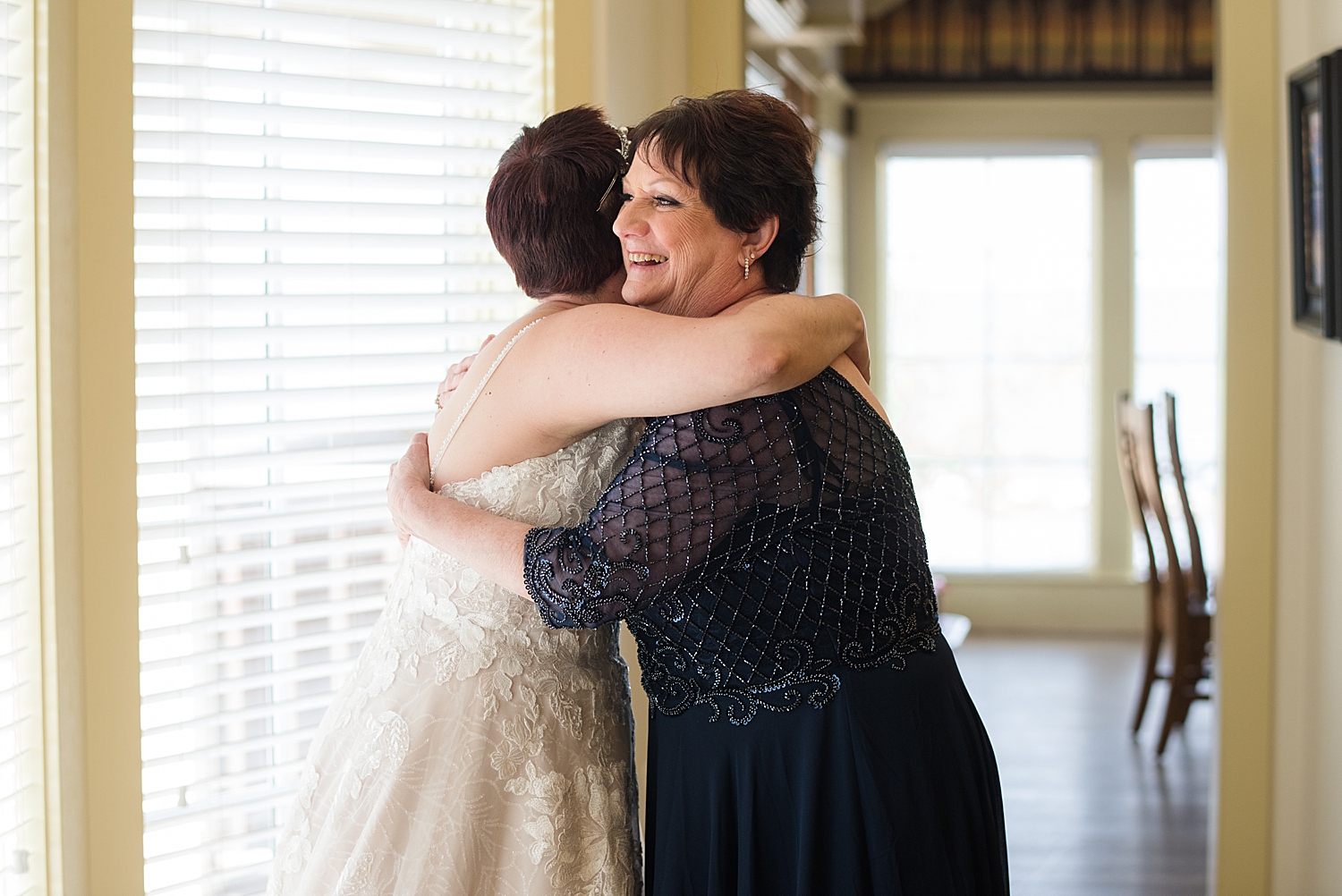 bride hugging mom