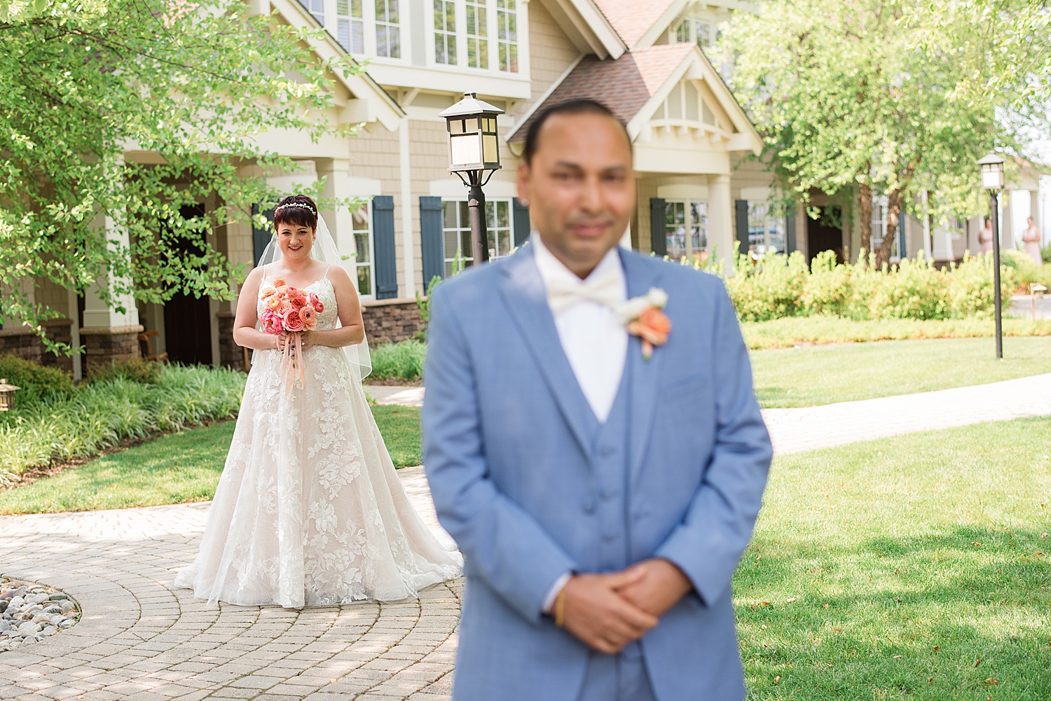 groom waiting for first look