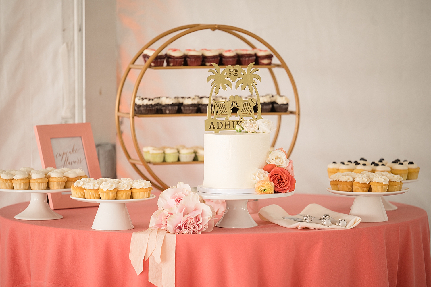 cake table with coral linens