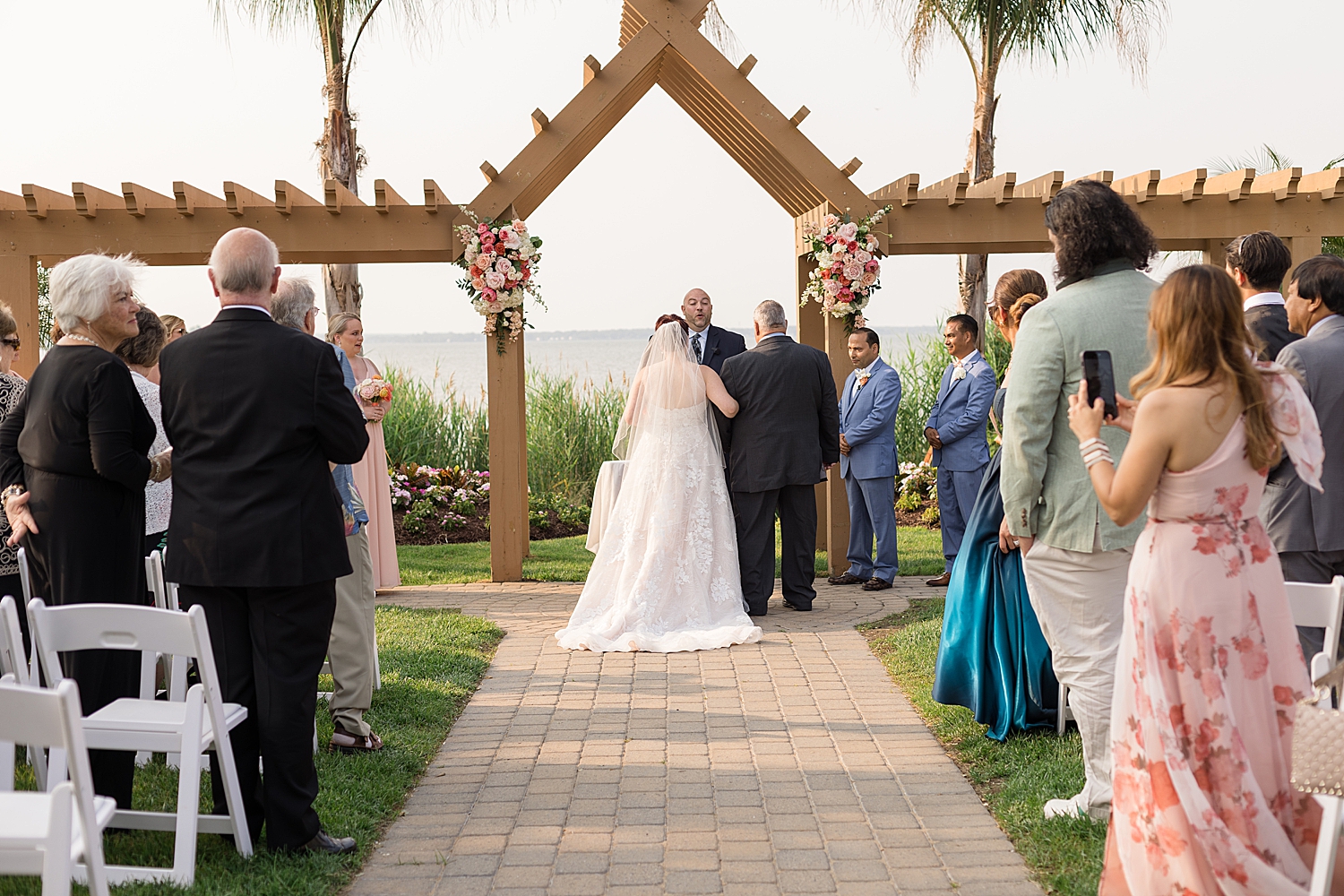 bride entering ceremony with dad