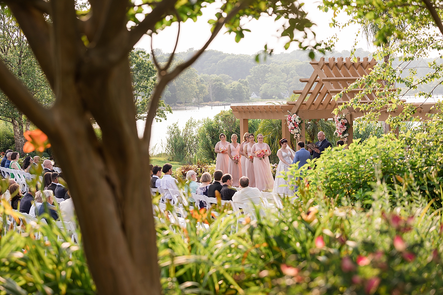 wedding ceremony through the trees