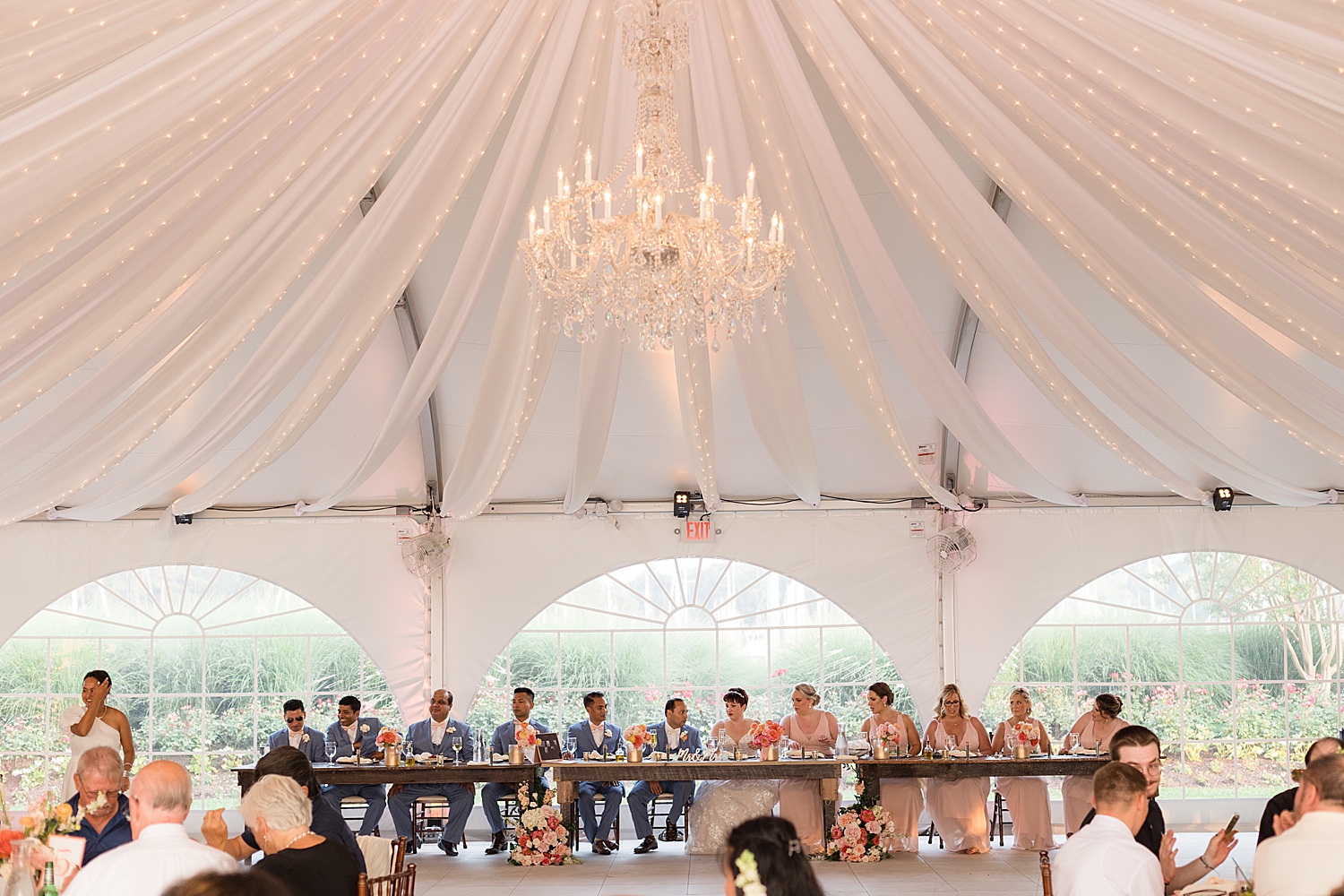 wide shot of head table under herrington tent