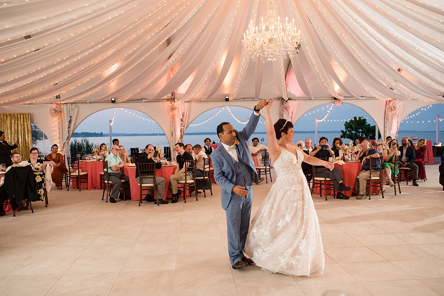 couple first dance under tent