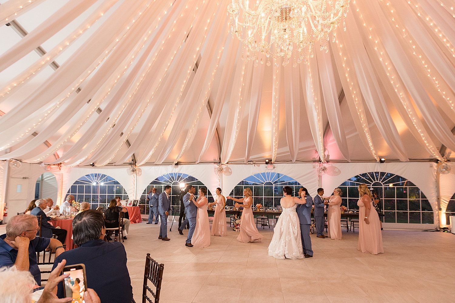 couple first dance under tent