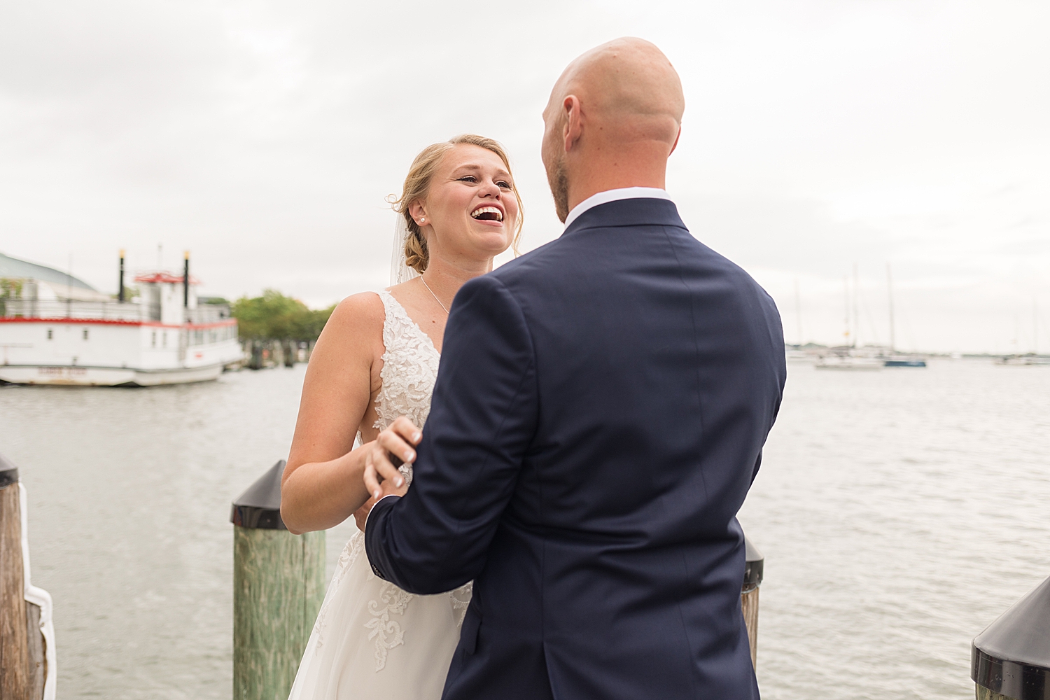 bride and groom annapolis docks first look