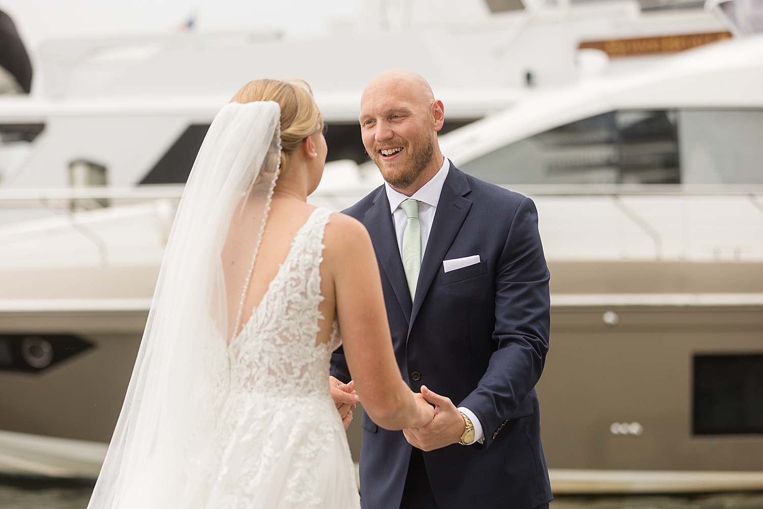 bride and groom annapolis docks first look