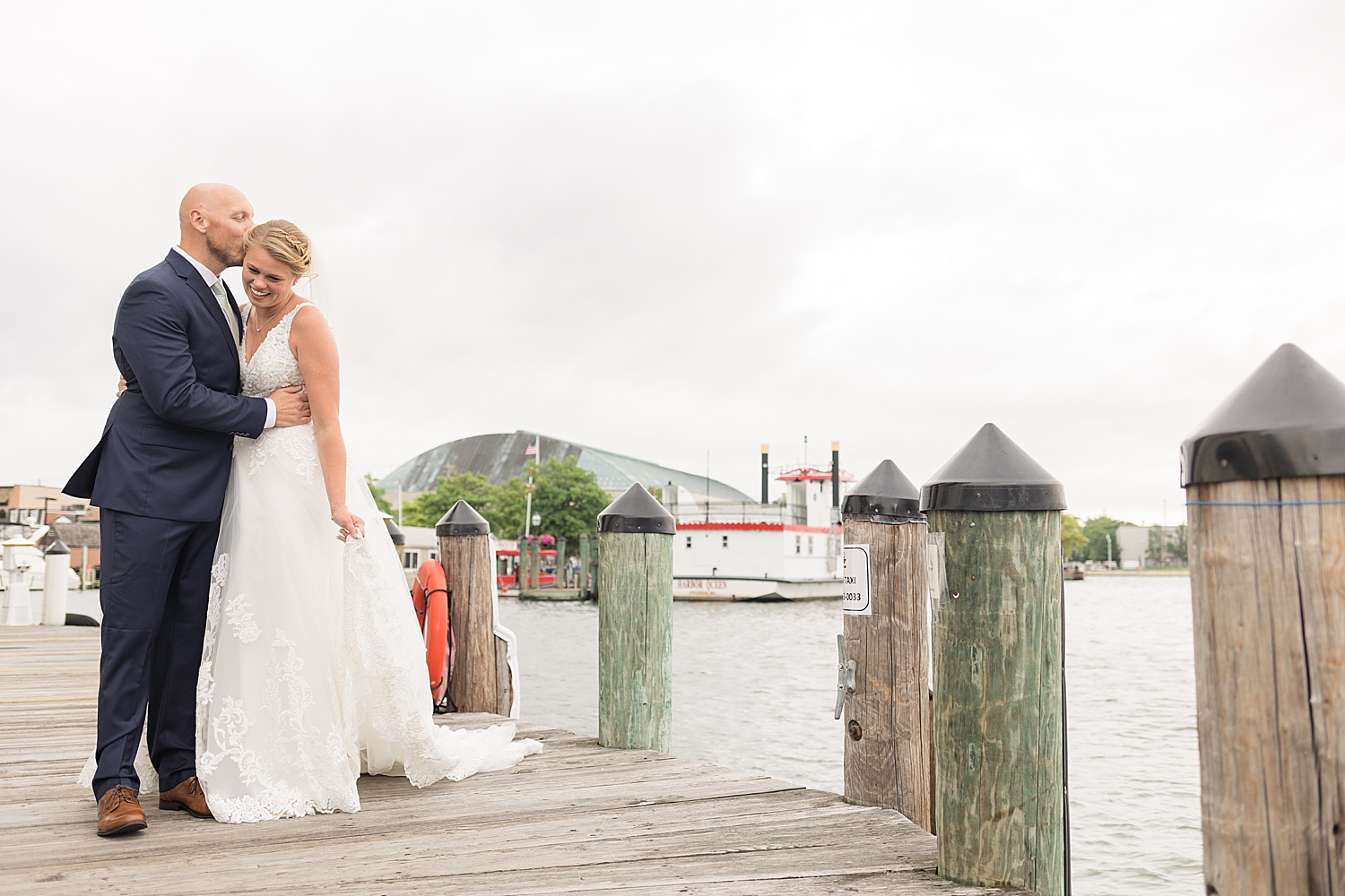 bride and groom annapolis docks portrait