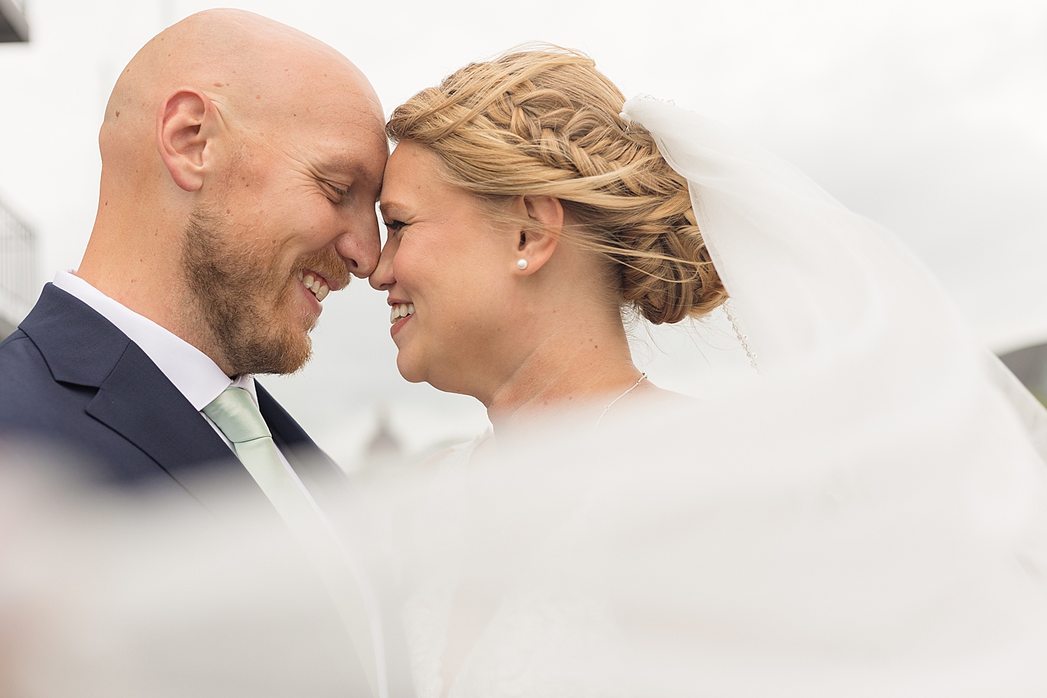 bride and groom annapolis docks portrait