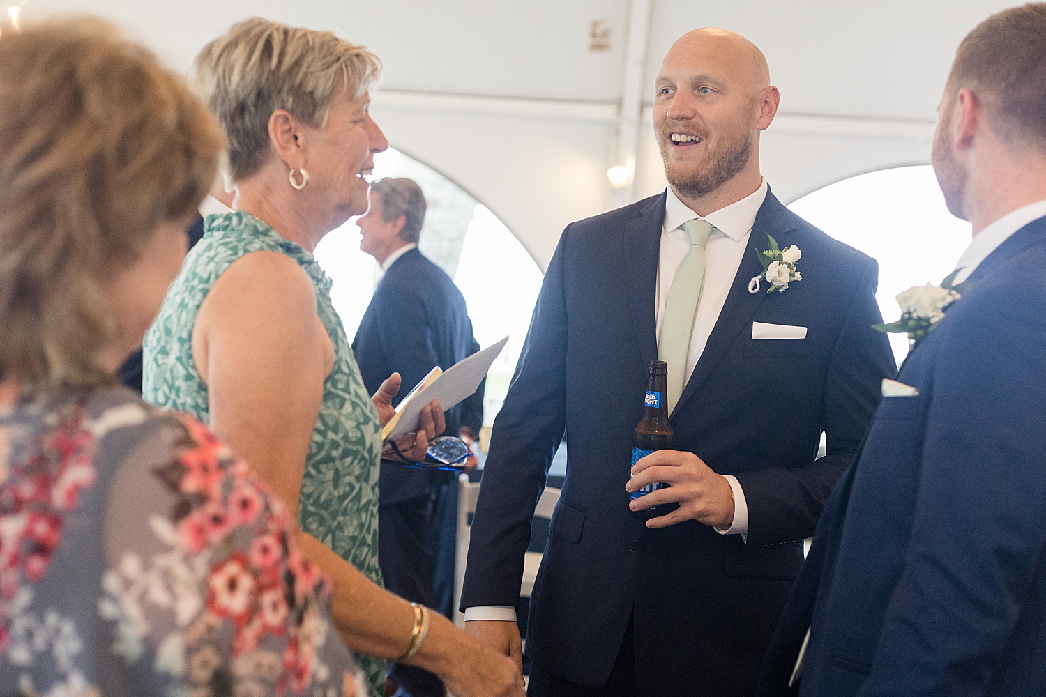 groom mingling with guests