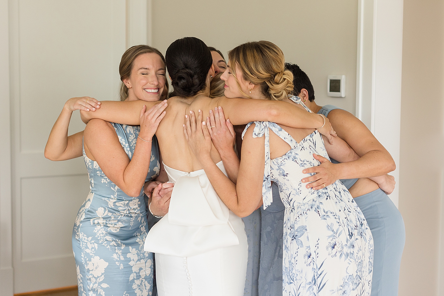 bridesmaids reveal hug