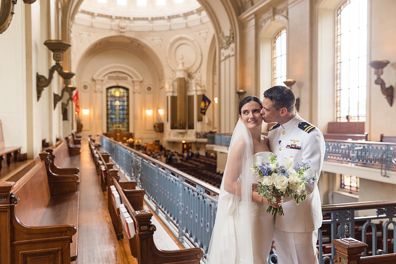 bride and groom portrait at naval academy chapel