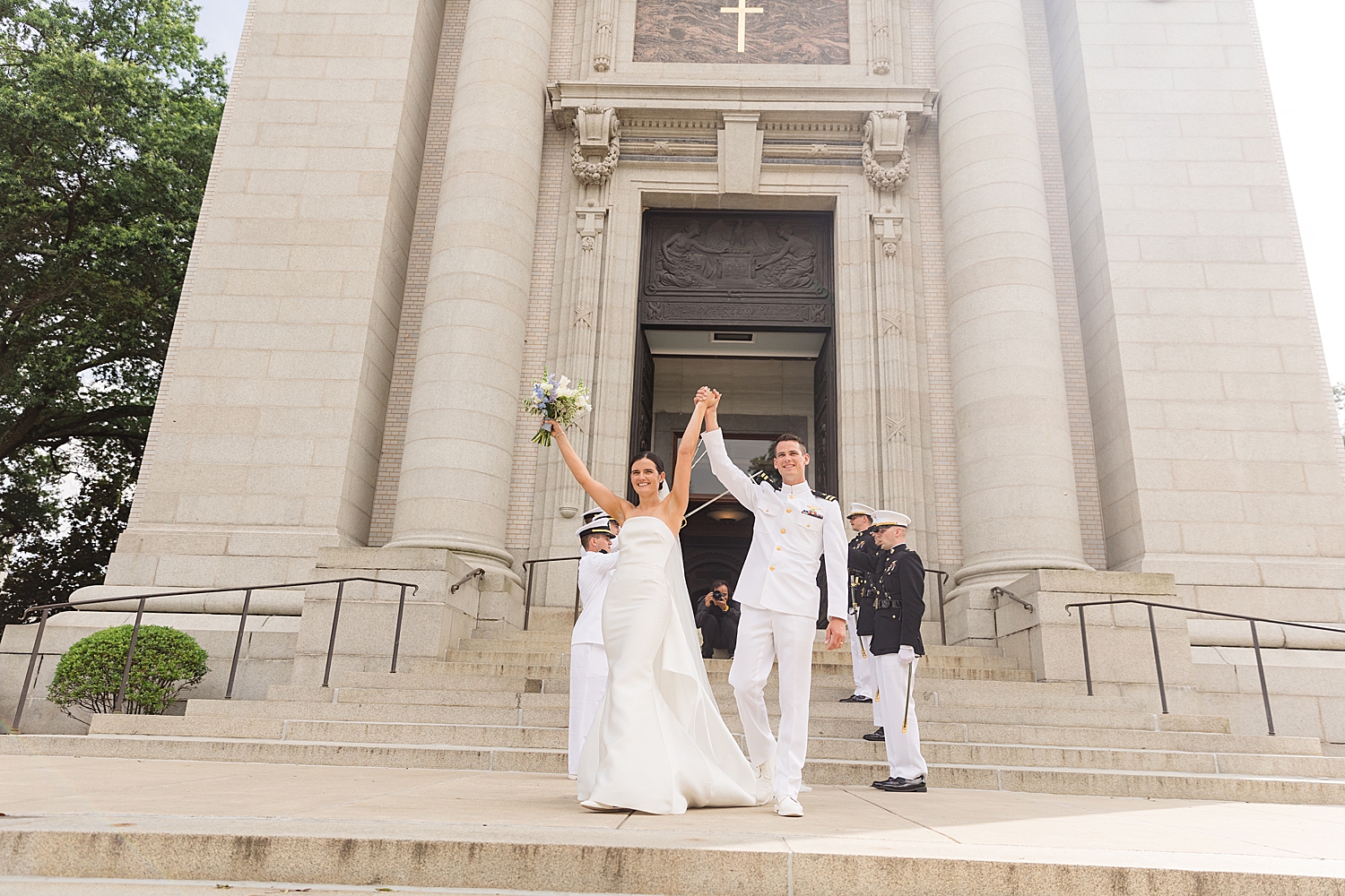 bride and groom leaving ceremony sword arch