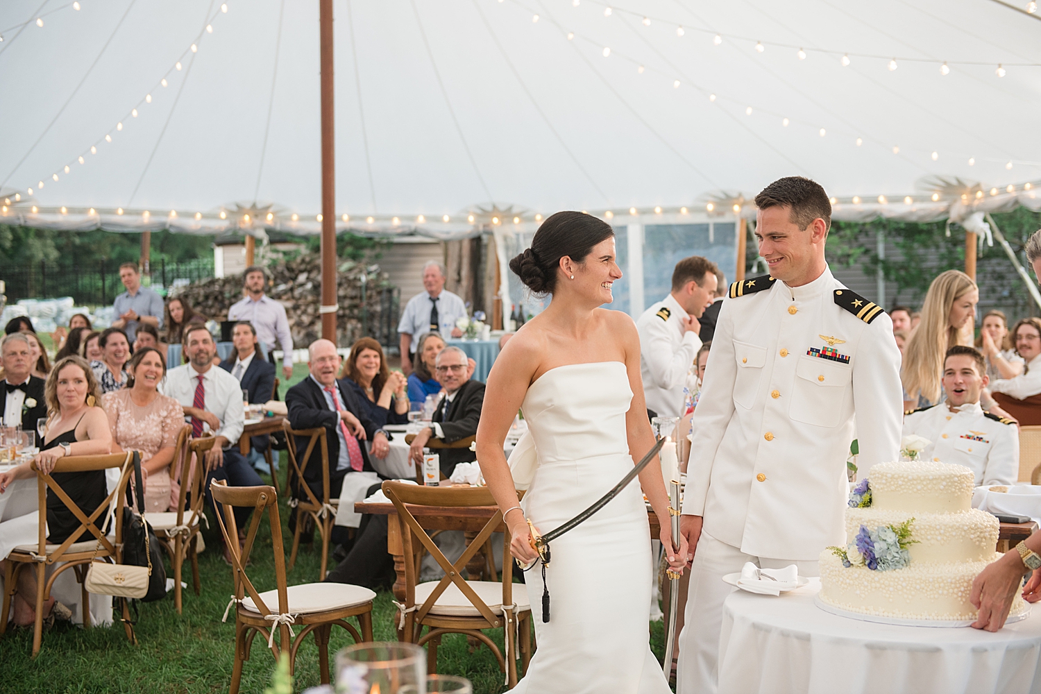 bride and groom cake cutting with sword