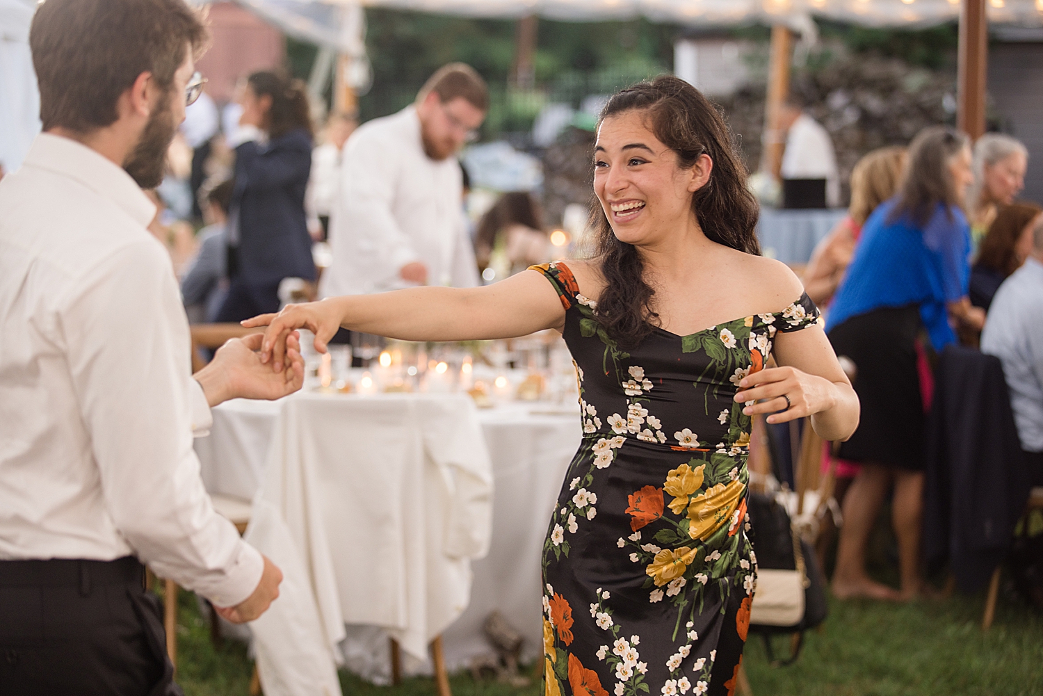 candid wedding guests dancing