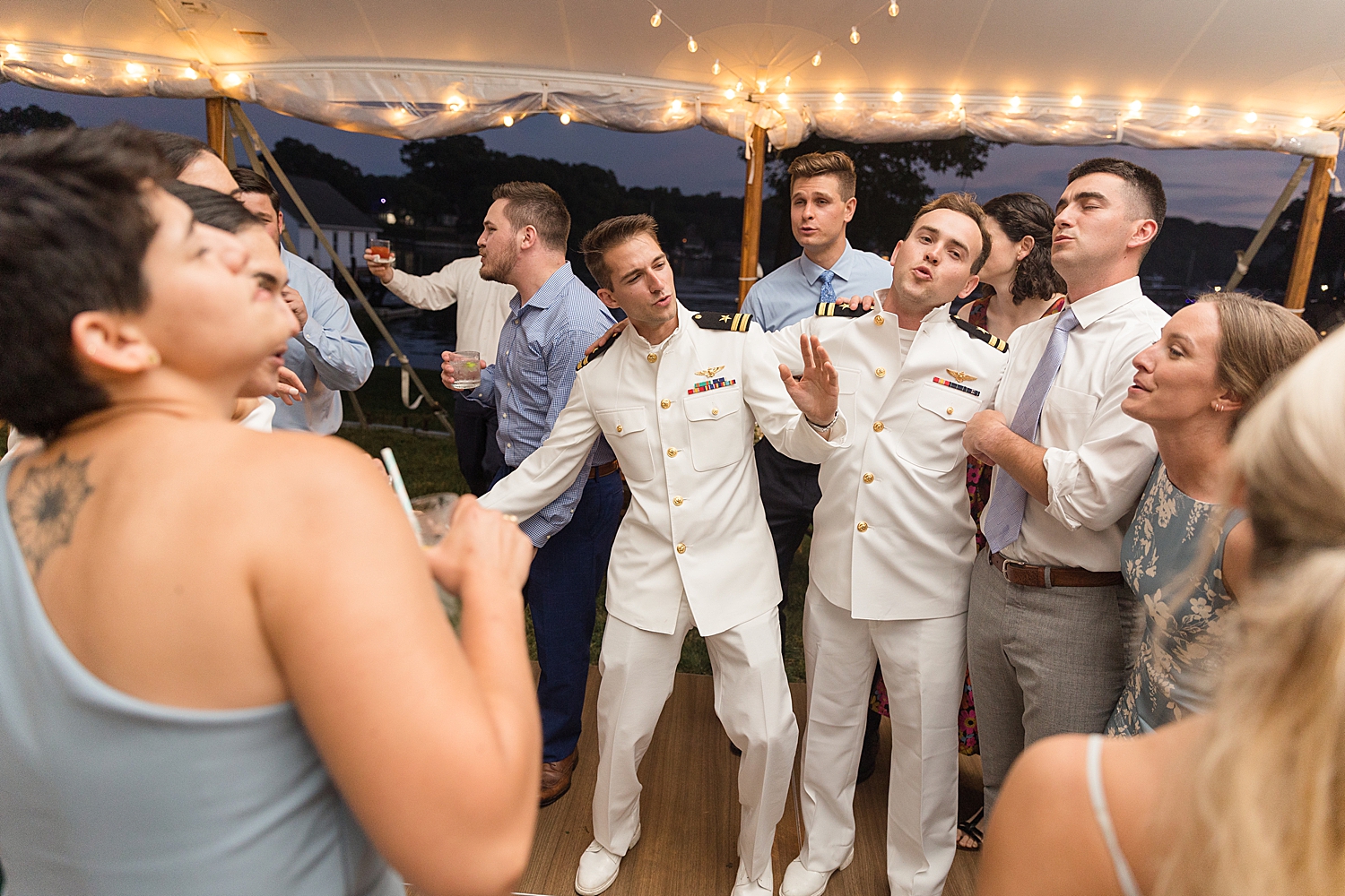 candid wedding guests dancing