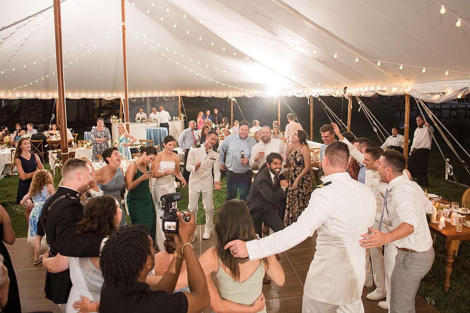 candid wedding guests dancing