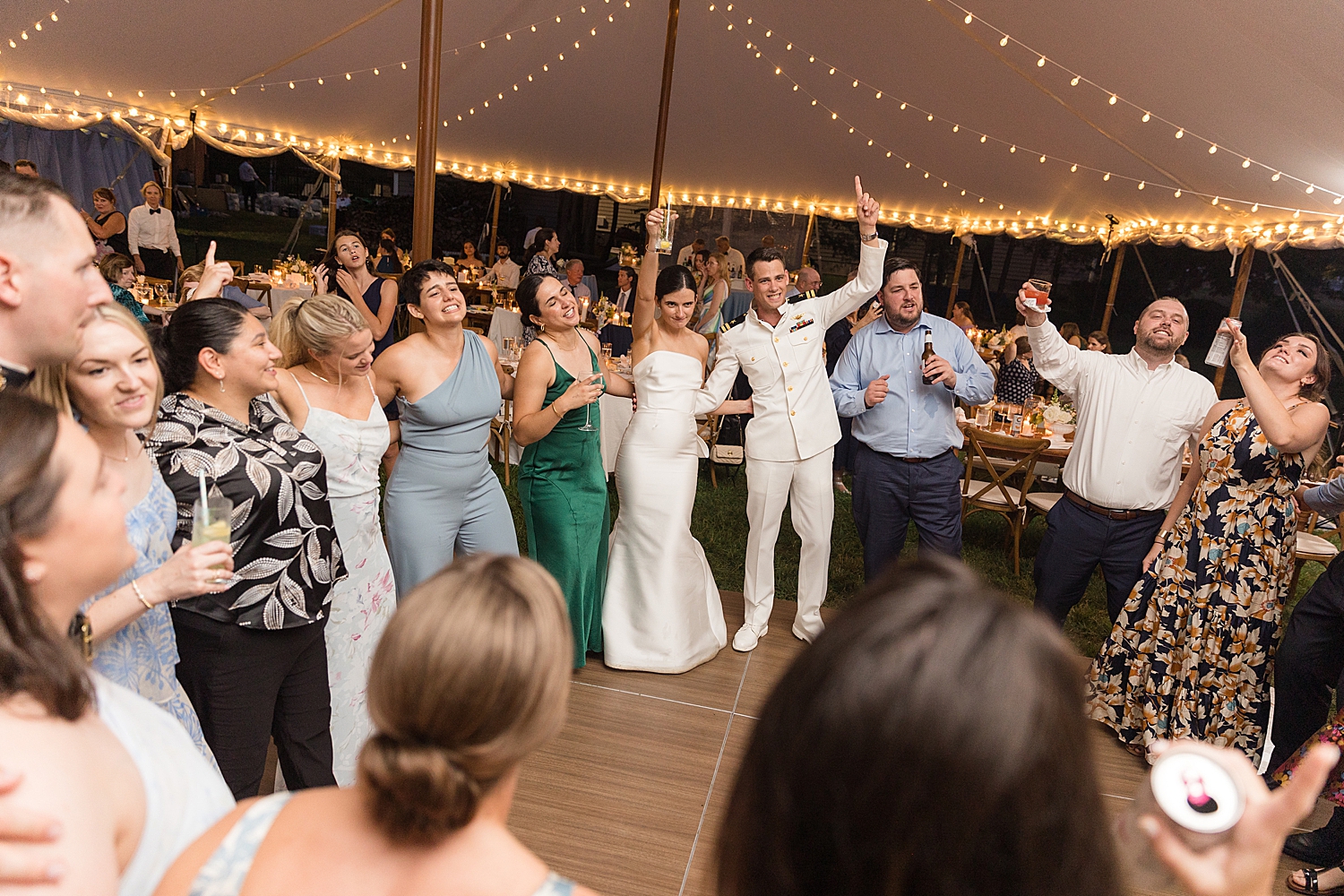 candid wedding guests dancing