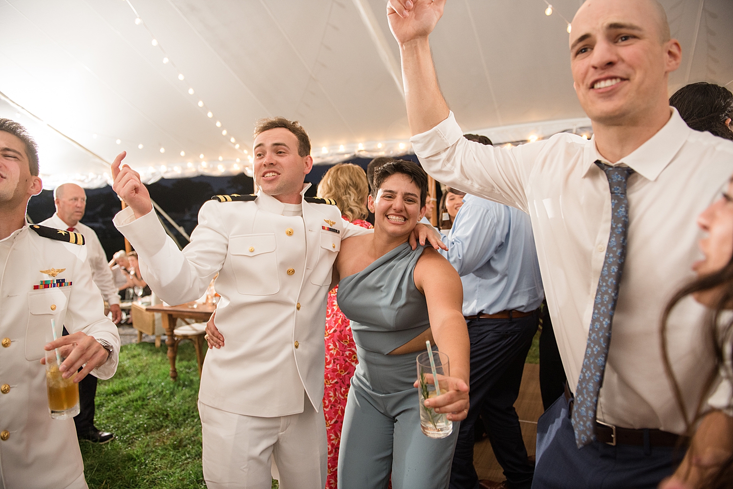 candid wedding guests dancing