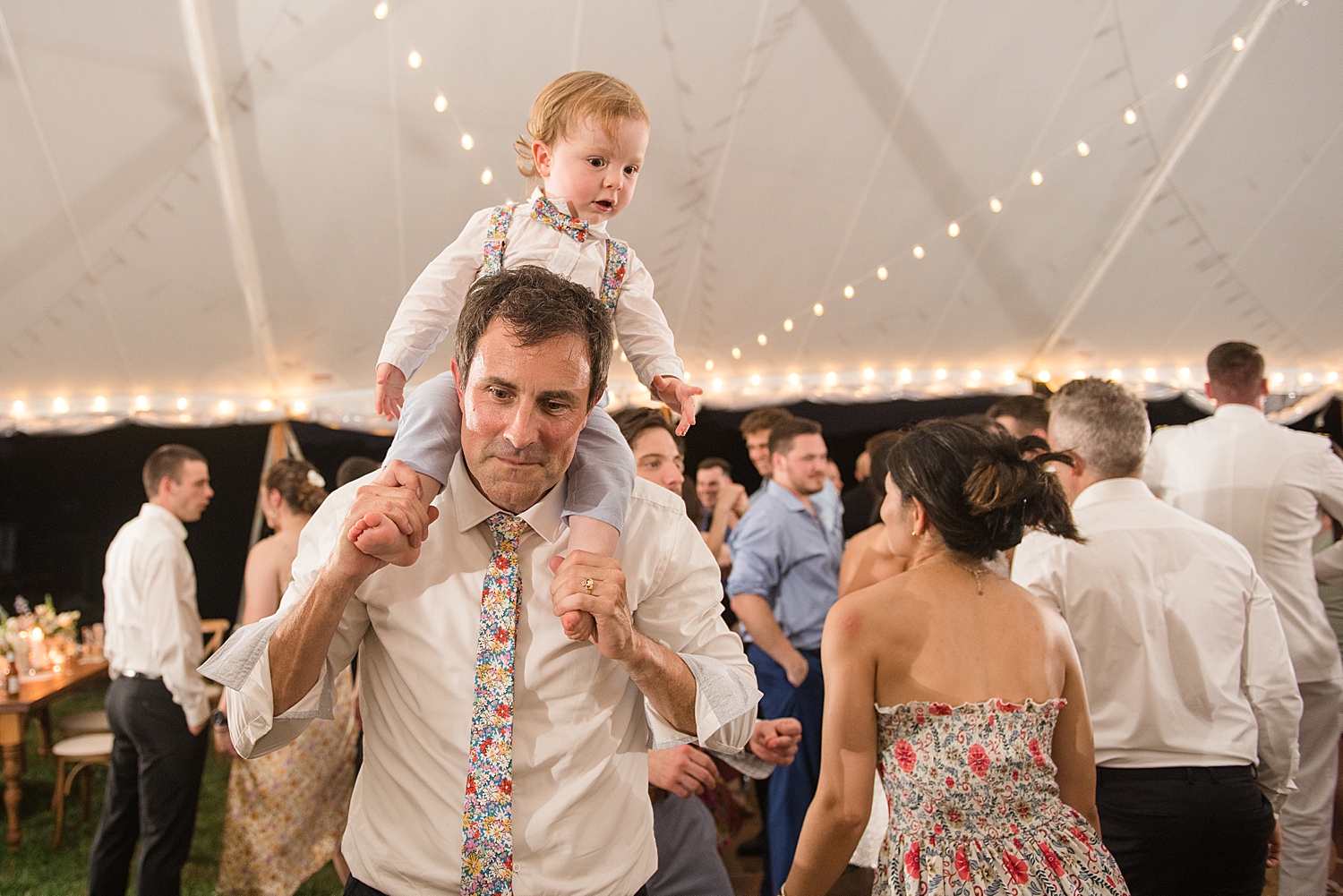 candid wedding guests dancing