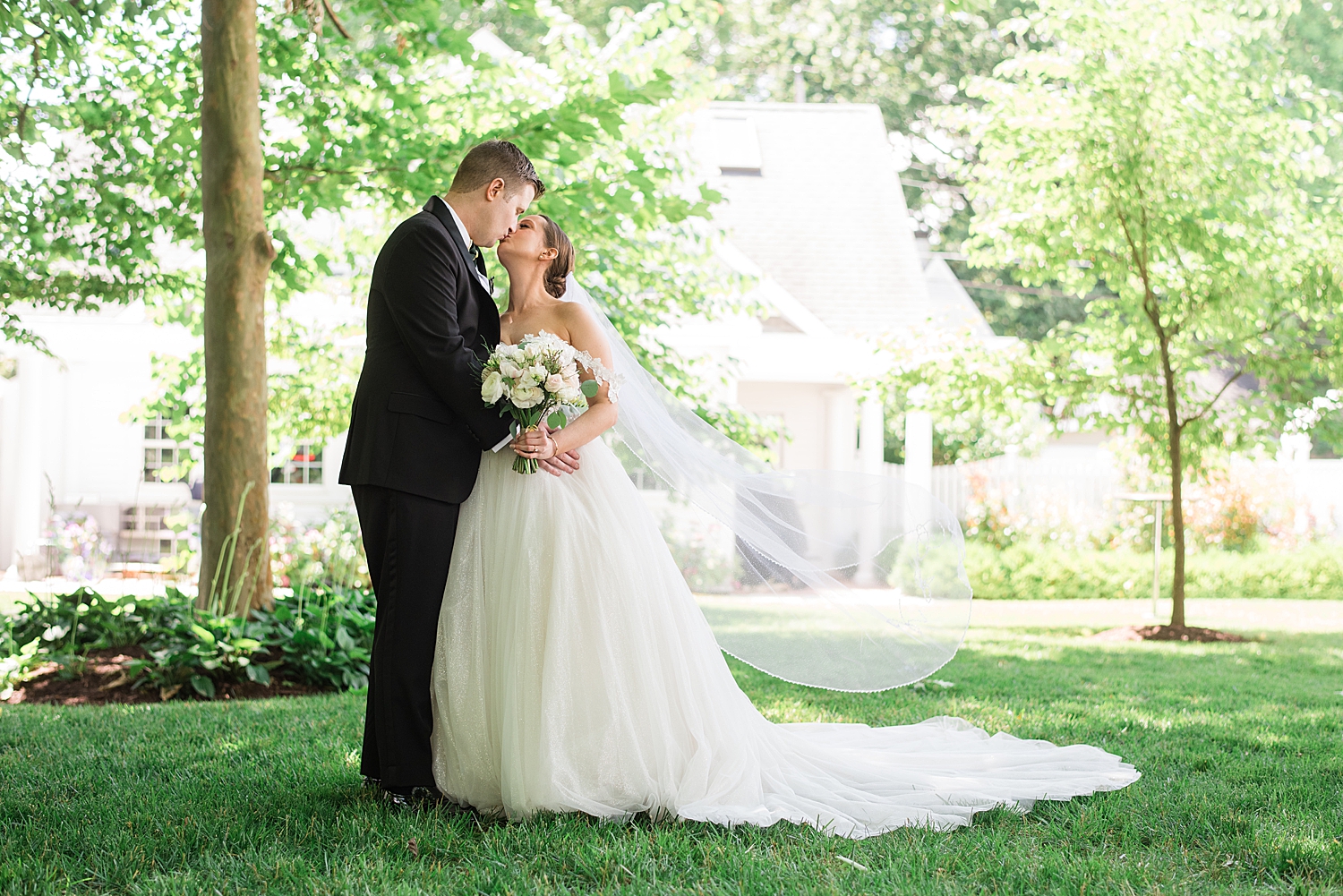 bride and groom portrait kiss