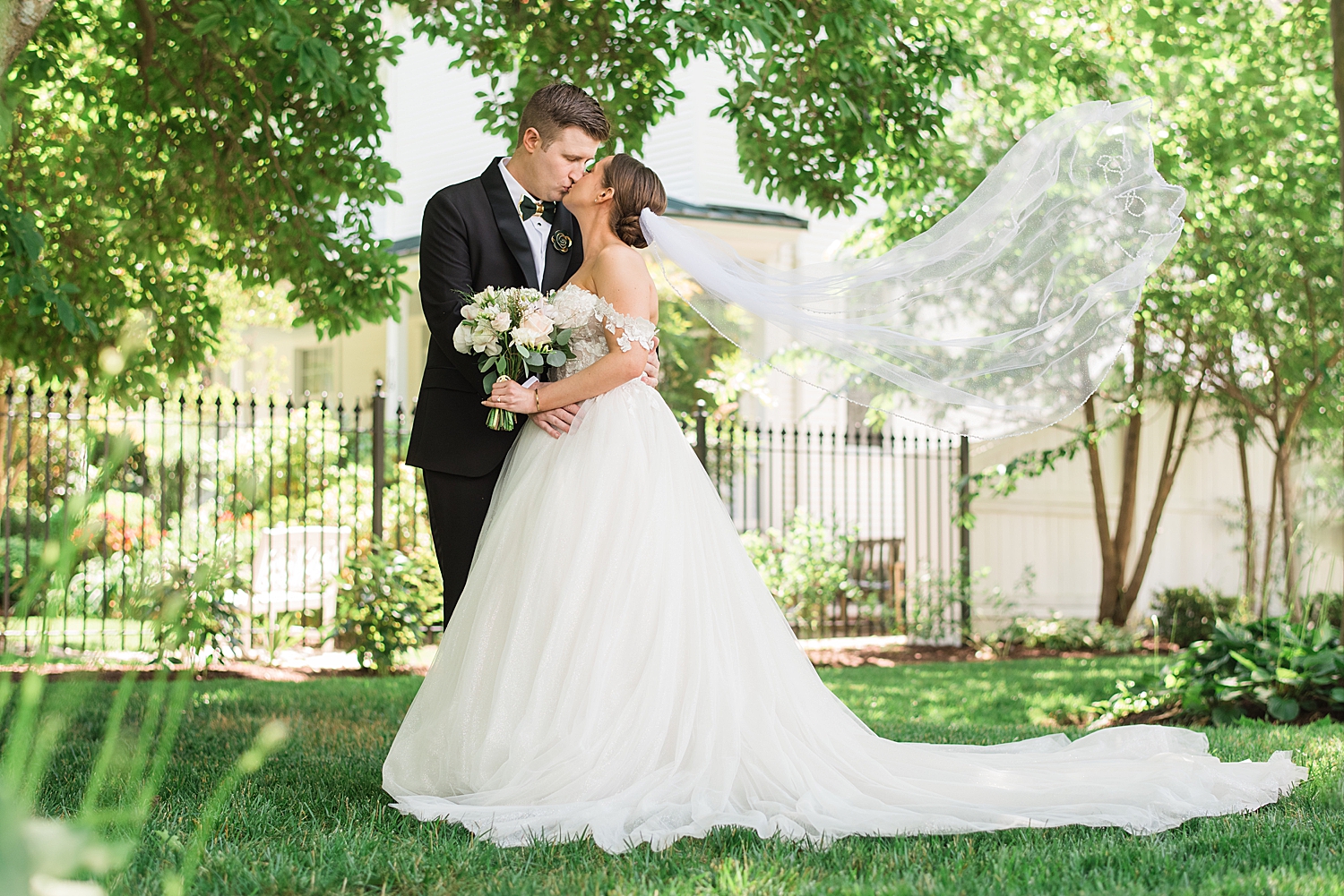 bride and groom portrait kiss