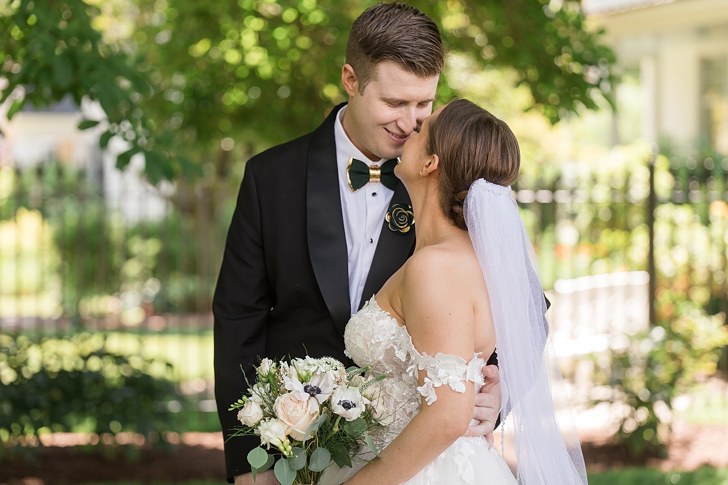 bride and groom portrait kiss