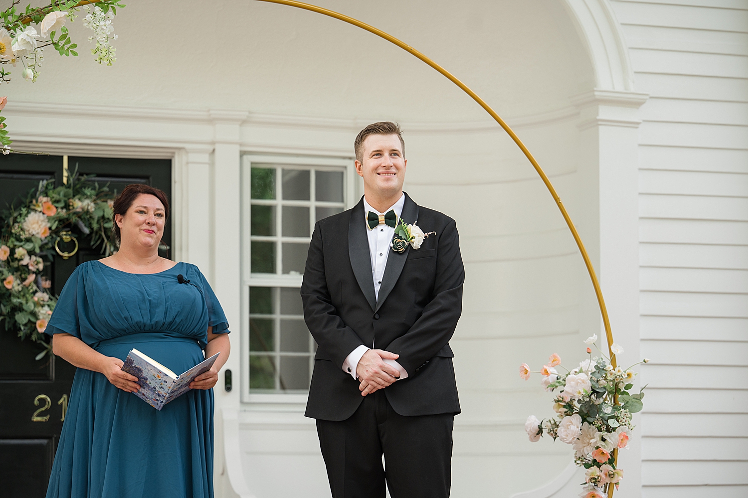 groom waits for bride at ceremony