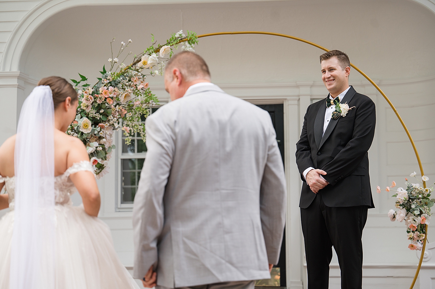 dad delivers bride to end of aisle