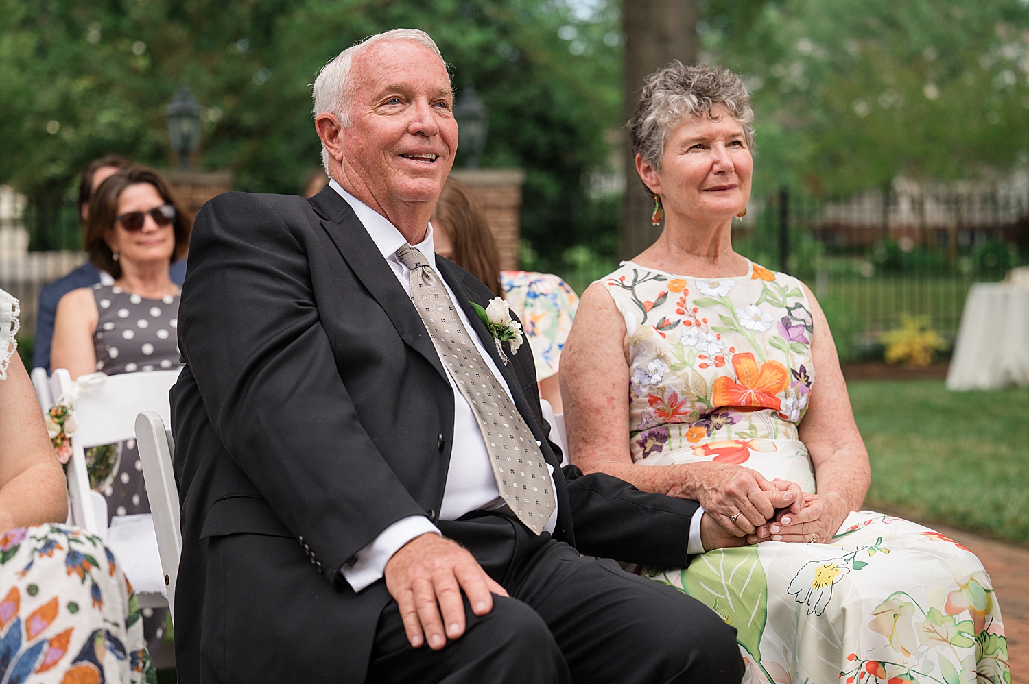 groom's parents react to wedding ceremony